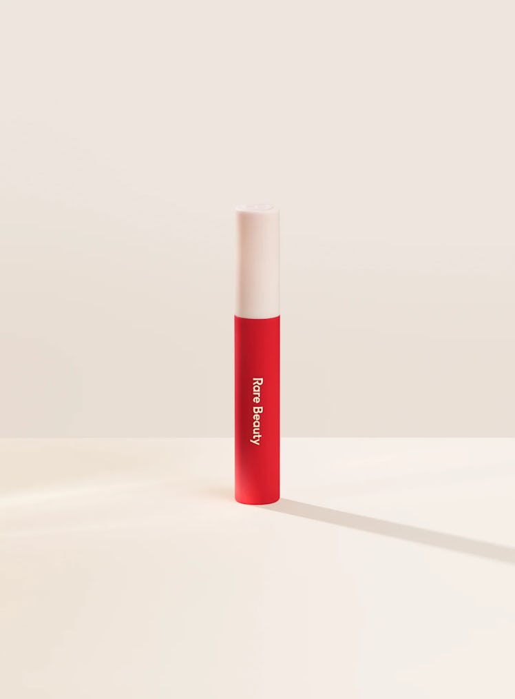 This lip cream from Selena Gomez's Rare Beauty is a great red lipstick choice for Taylor Swift fans....