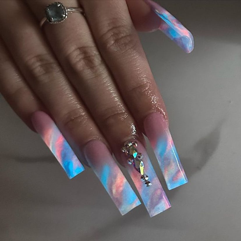 Glowing galaxy nails.