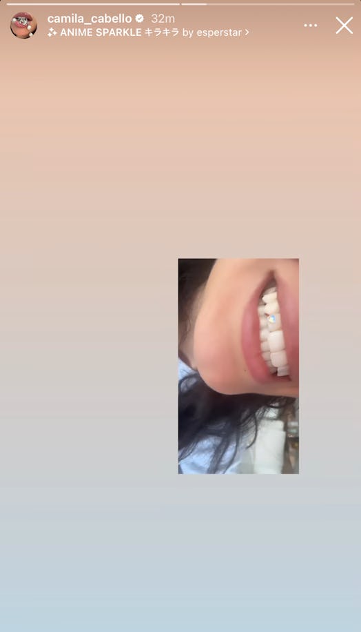 Camila Cabello debuted a heart-shaped, holographic tooth gem on Instagram.