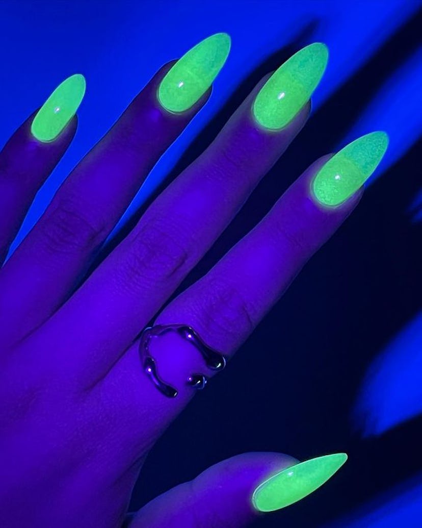Green glow-in-the-dark nails.