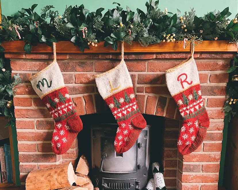 heirloom Christmas stockings on a mantel