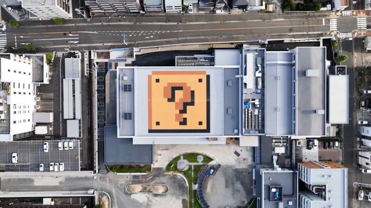 Nintendo Museum seen from above with question box on its roof.
