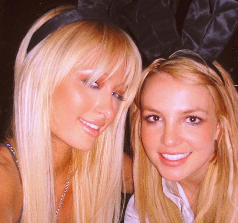 Paris Hilton and Britney Spears pose for a selfie.