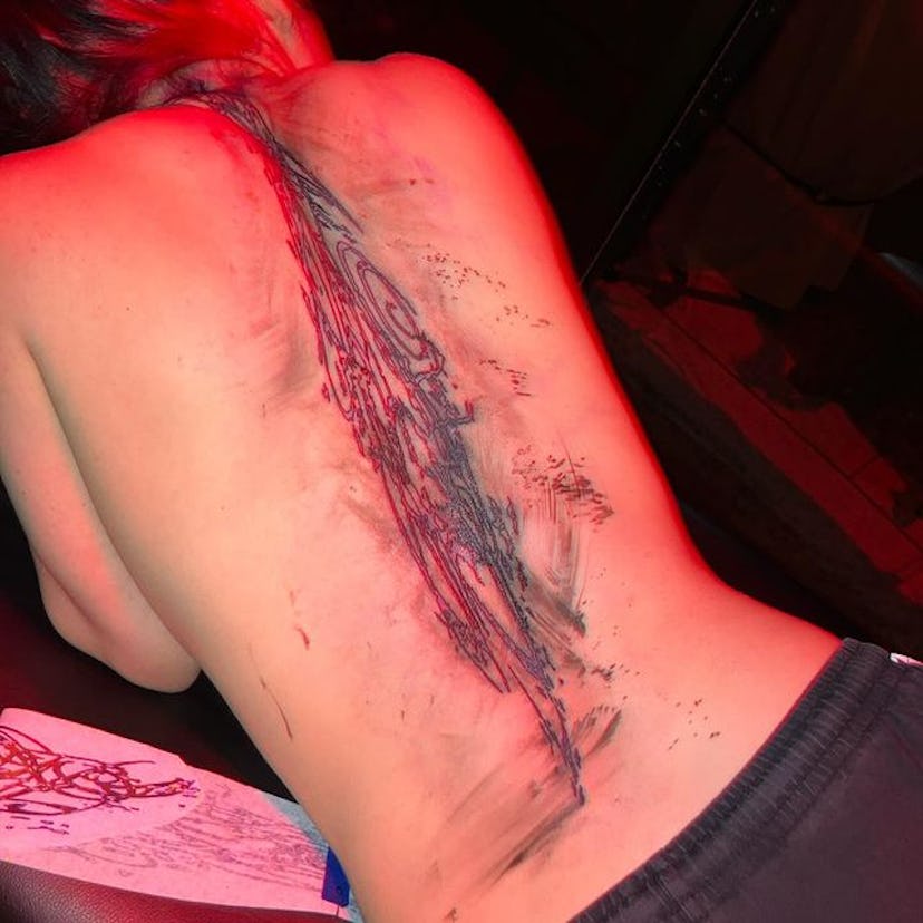 Billie Eilish giant back tattoo