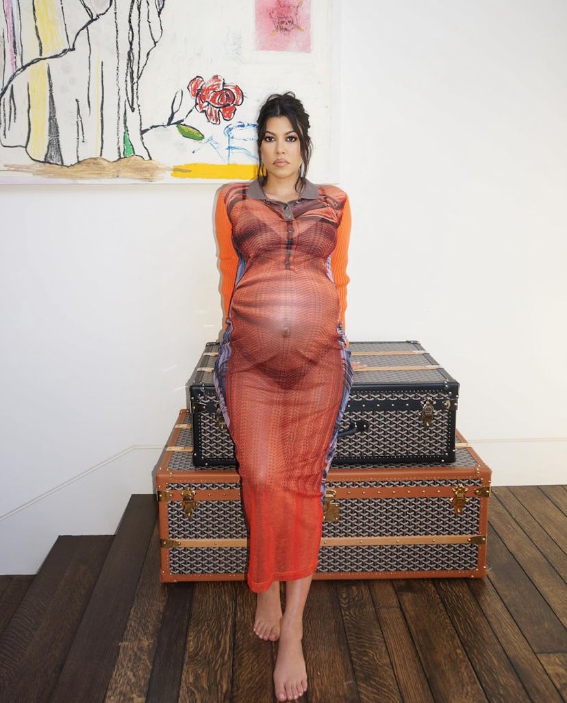 Kourtney wearing a button-down maxi dress and underwear posted on Instagram on Oct. 18.