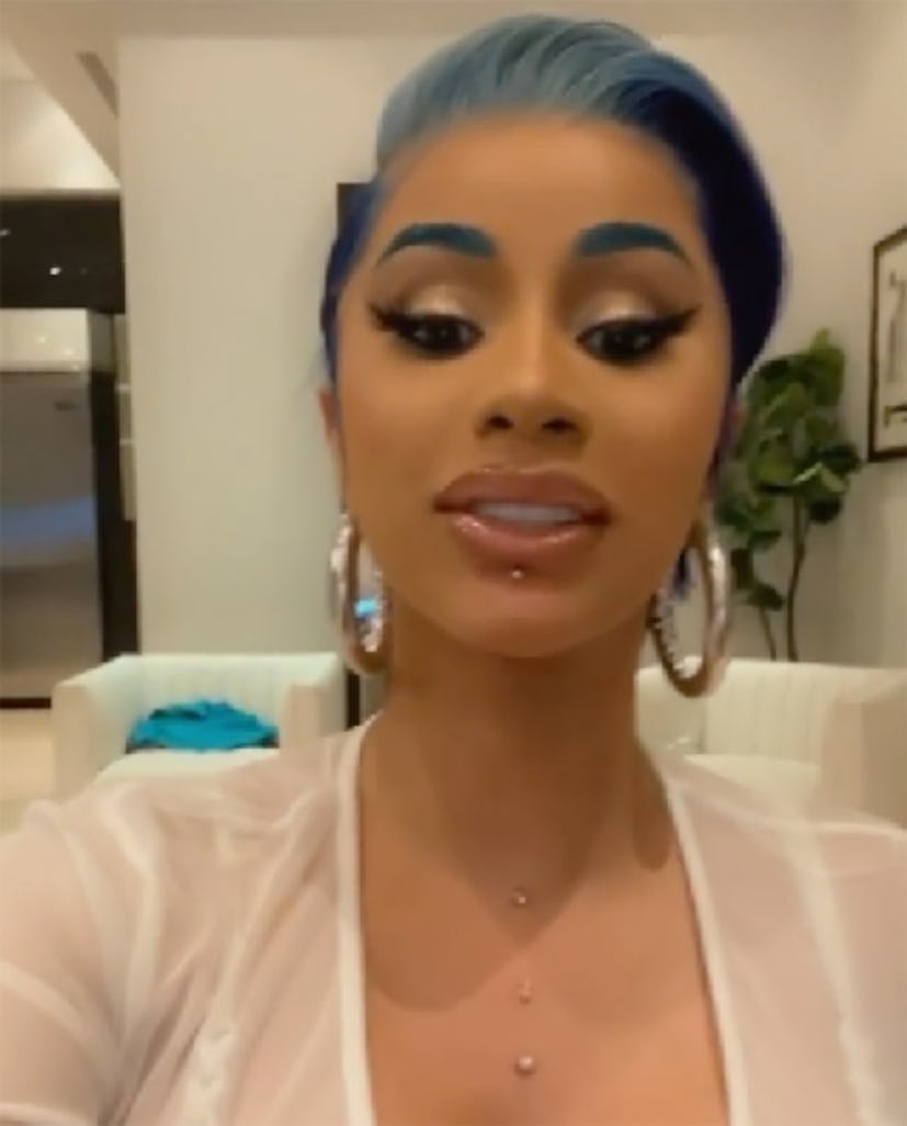 Cardi B lip and chest piercings 
