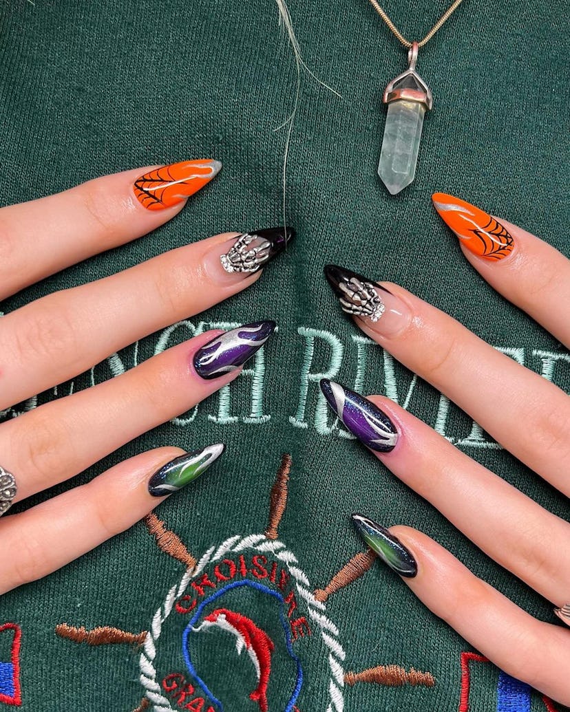A mix of trendy Halloween nail designs for 2023.