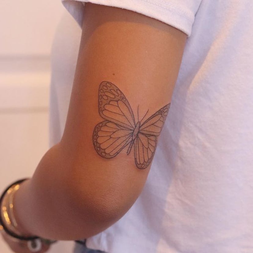 Gemini is into trendy tattoos, like butterflies and other '90s designs.
