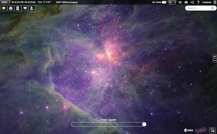image of interstellar gas in shades of green, purple, and orange, dotted with stars