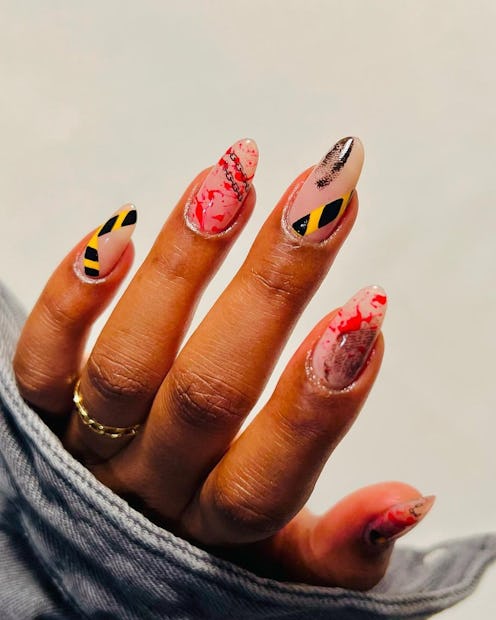 Here are trendy Halloween nail art designs for 2023.