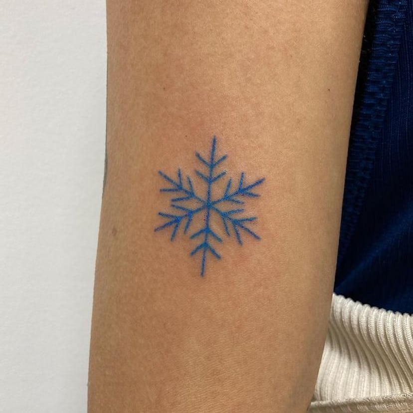 Blue snowflake tattoos.