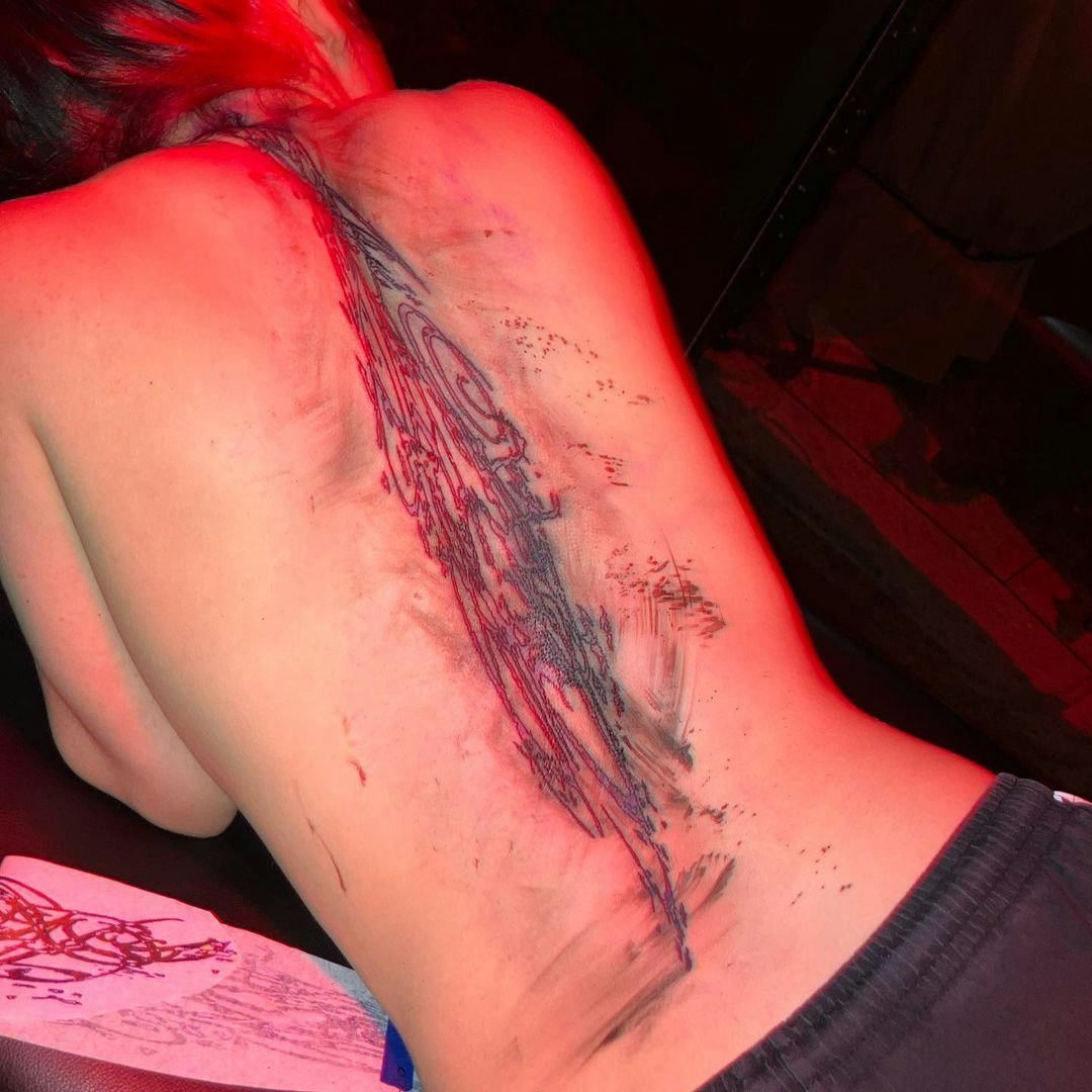 Billie Eilish&rsquo;s new back tattoo, debuted in Oct. 2023.