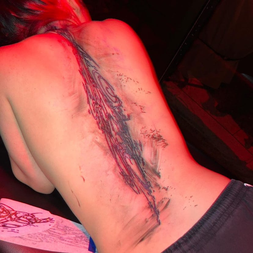 Billie Eilish’s new back tattoo, debuted in Oct. 2023.