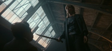 Sylvie (Sophia Di Martino) stands over Victor Timely (Jonathan Majors) in 'Loki' Season 2