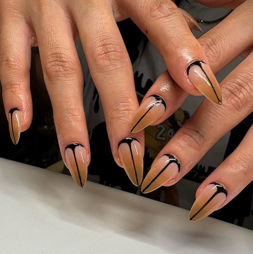 A scorpion-inspired nail art design for scorpio season 2023 manicure ideas.