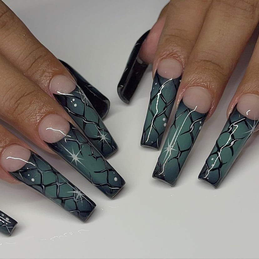 A barbed wire French tip nail art design for scorpio season 2023 manicure ideas.