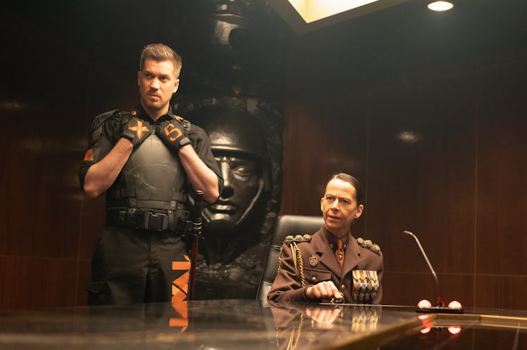 Rafael Casal as Hunter X-5 and Kate Dickie as General Dox in Marvel Studios' LOKI, Season 2.
