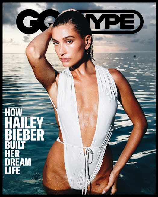 hailey bieber wears a white YSL swimsuit on the cover of gq hype