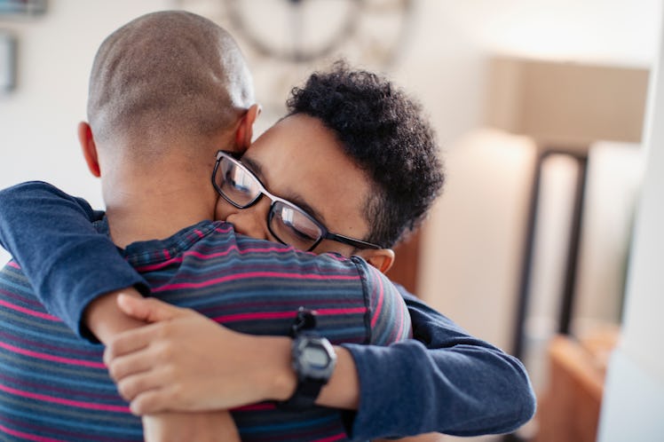 A dad and son embraced in a 20-second hug.