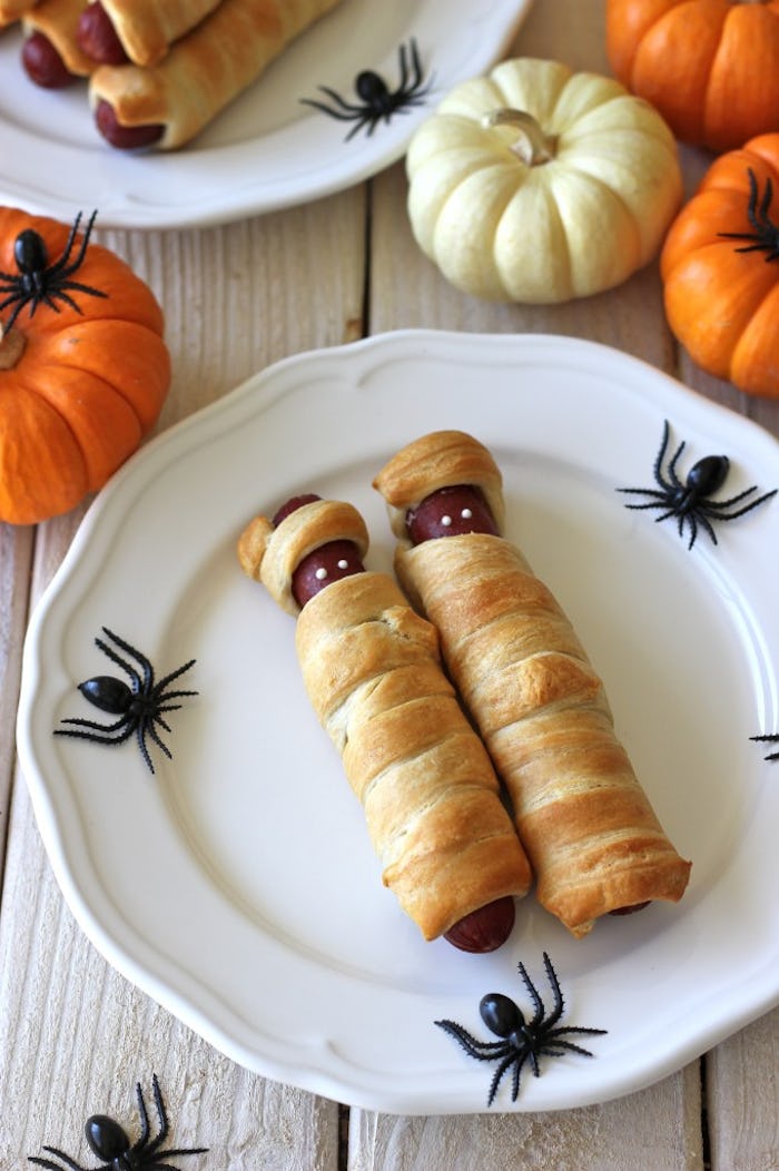 Mummy hot dogs, one of many cute halloween lunch ideas for kids