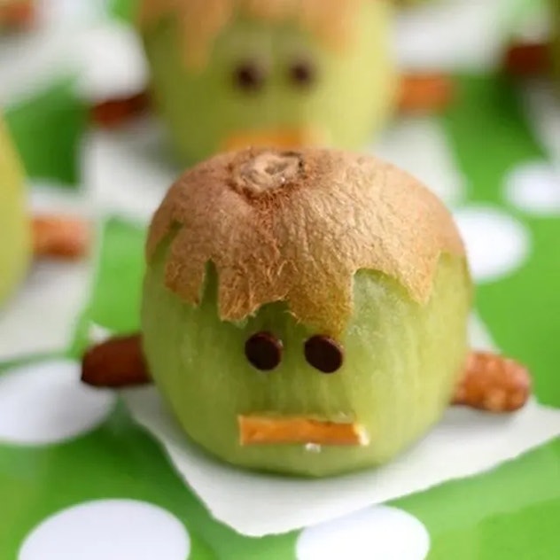 A kiwi decorated like Frankenstein, one of many cute Halloween lunch ideas for kids