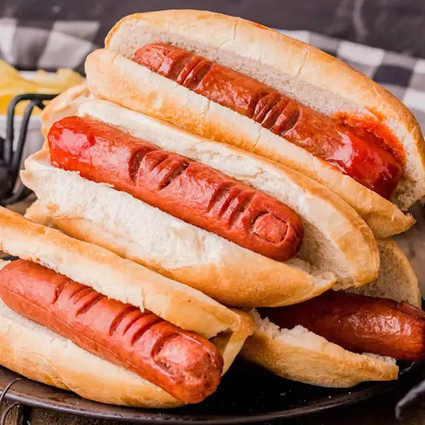 Hot dogs sliced to look like cooked fingers, a creepy Halloween lunch idea for kids
