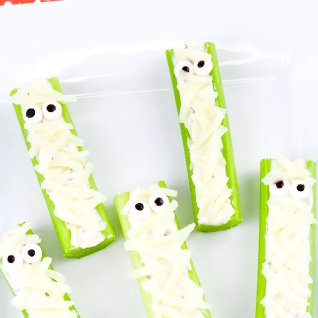 Mummy celery sticks, one of many cute Halloween lunch ideas for kids