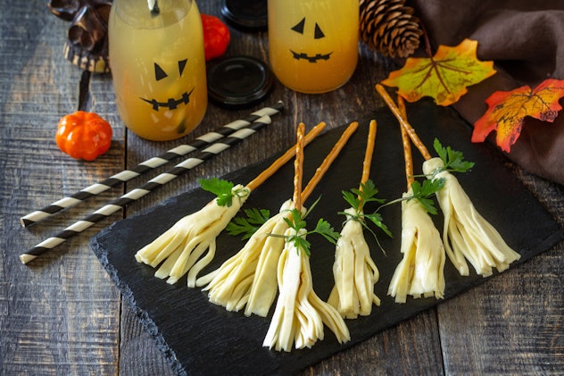 String cheese pretzel witch brooms, a super cute Halloween lunch idea for kids