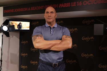 The wax statue of famous American actor Dwayne Johnson is reinstalled at the Grevin Museum in Paris,...