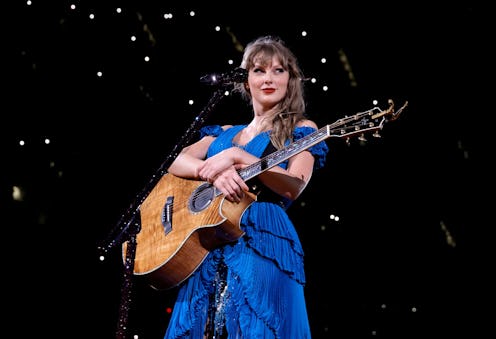 Taylor Swift performing at her Eras Tour concert.