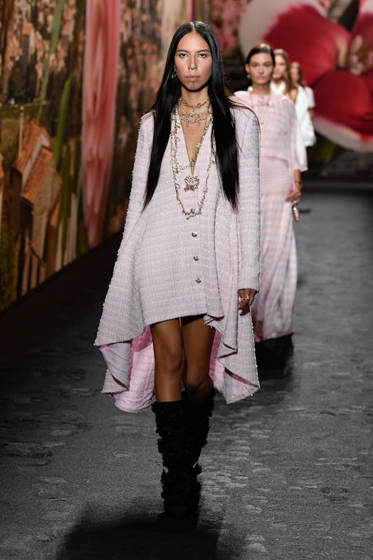 Quannah ChasingHorse walks the runway at Chanel Ready To Wear Spring 2024 held at Grand Palais Ephém...