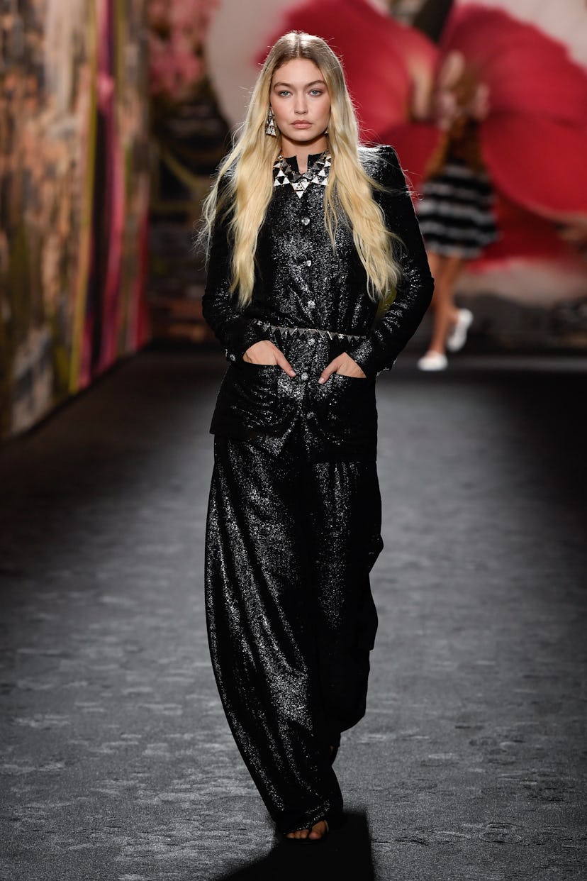 Gigi Hadid walks the runway at Chanel Ready To Wear Spring 2024 held at Grand Palais Ephémère on Oct...
