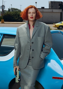 Karen Elson wearing a leather suit