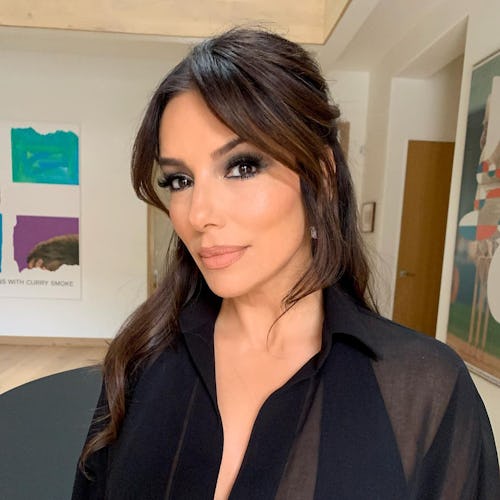 Eva Longoria half-up hairstyle with curtain bangs