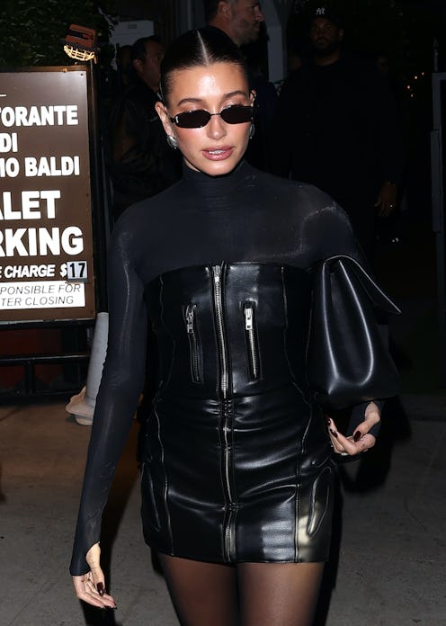Hailey Bieber wears a strapless leather mini dress from kylie jenner's brand khy