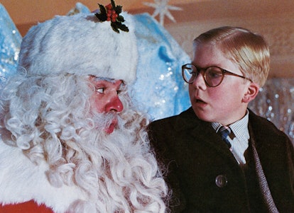 Peter Billingsley sits on Santa's lap in a scene from the film 'A Christmas Story', 1983. (Photo by ...