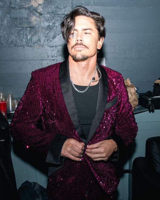 Tom Sandoval in a maroon sparkly suit jacket