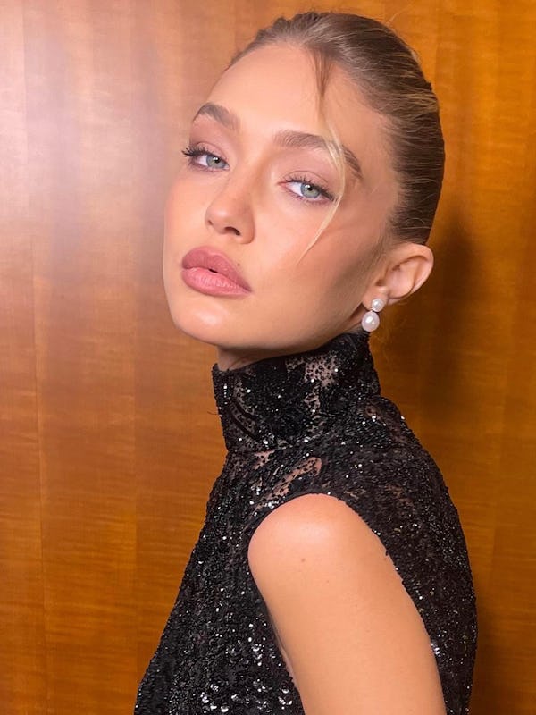 Gigi Hadid’s French roll hairstyle was created by Dimitris Giannetos for Miu Miu’s Paris Fashion Wee…