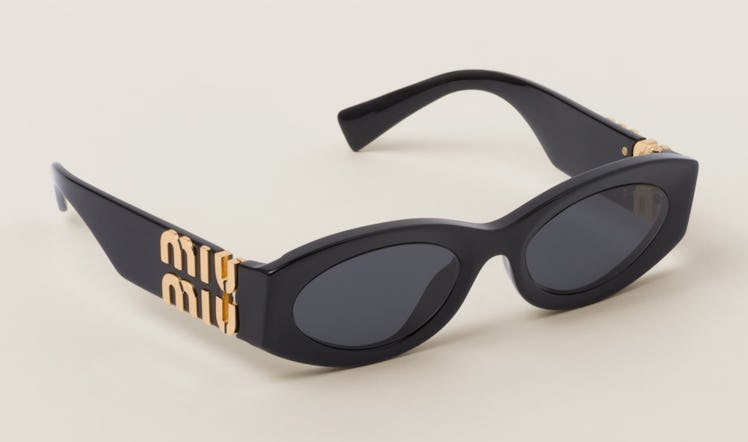 black sunglasses with gold logo