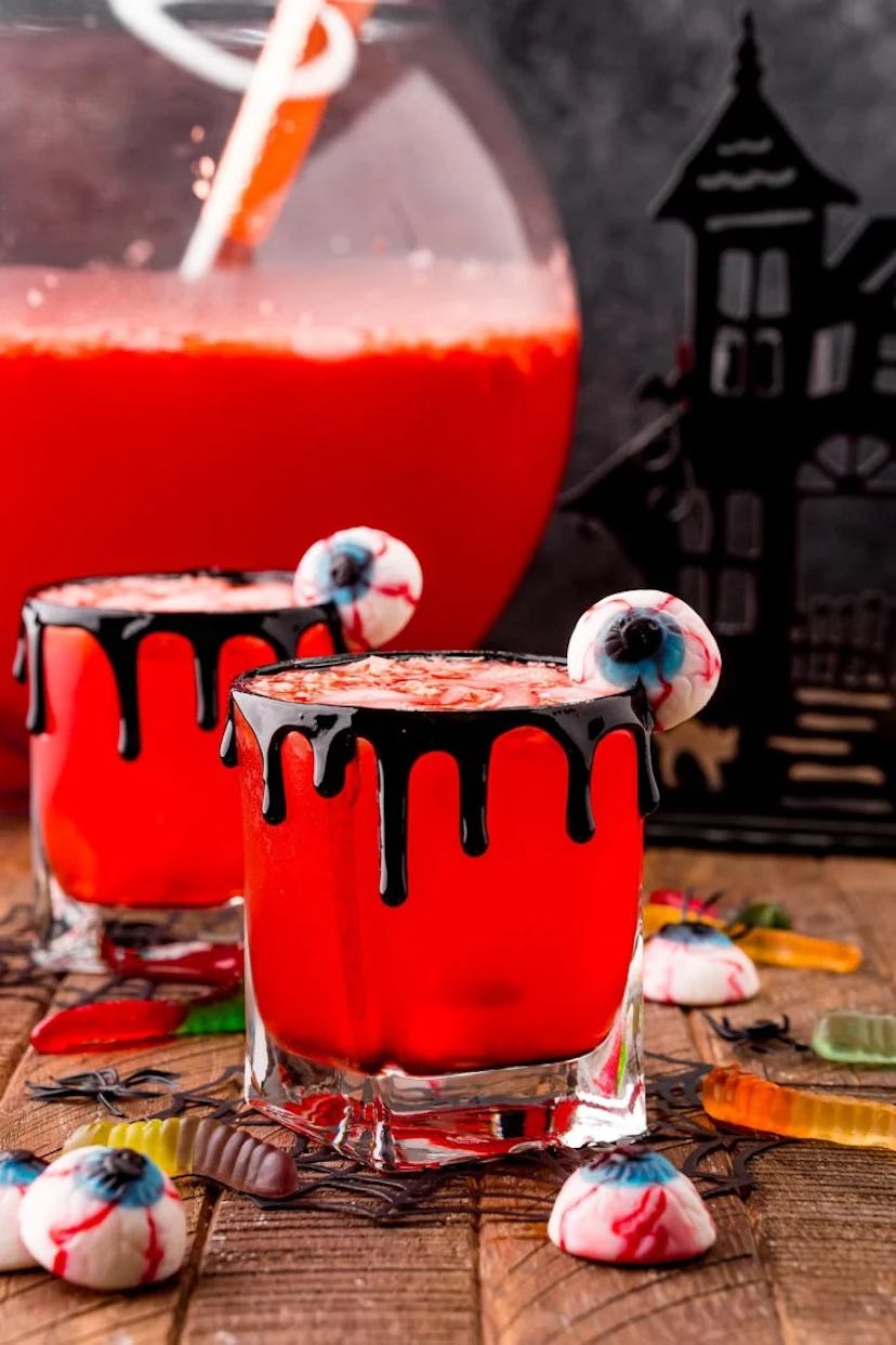 Kids Halloween punch, a red Halloween mocktail made with Hawaiian punch, is perfect for kids and pre...