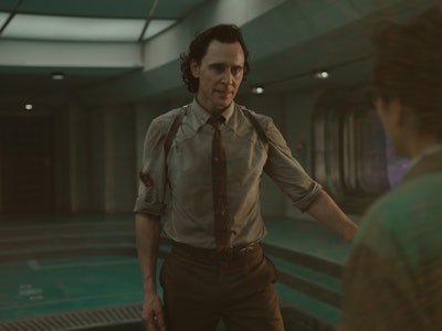 Tom Hiddleston as Loki and Ke Huy Quan as Ouroboros in Episode 1 of 'Loki' Season 2