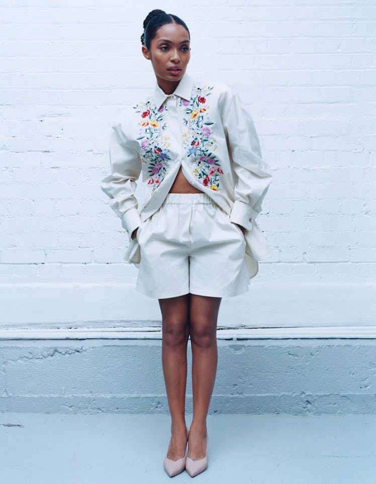 Yara Shahidi wears a Max Mara shirt, shorts, and shoes.