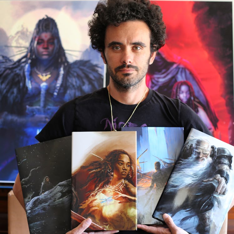 Sebastian A. Jones poses with Stranger Comics art.