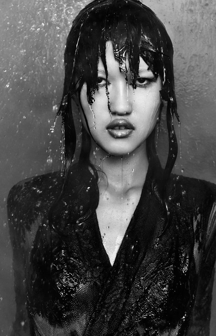 Aselia Toktorova wears a Dolce & Gabbana coatdress and bra.