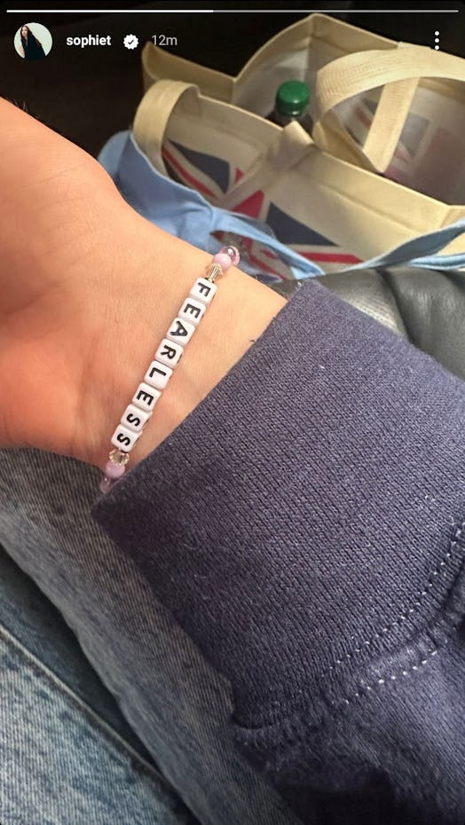 A screenshot of Sophie Turner's Instagram Story, featuring a "Fearless" bracelet