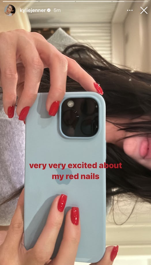 Kylie Jenner's short cherry red nails.
