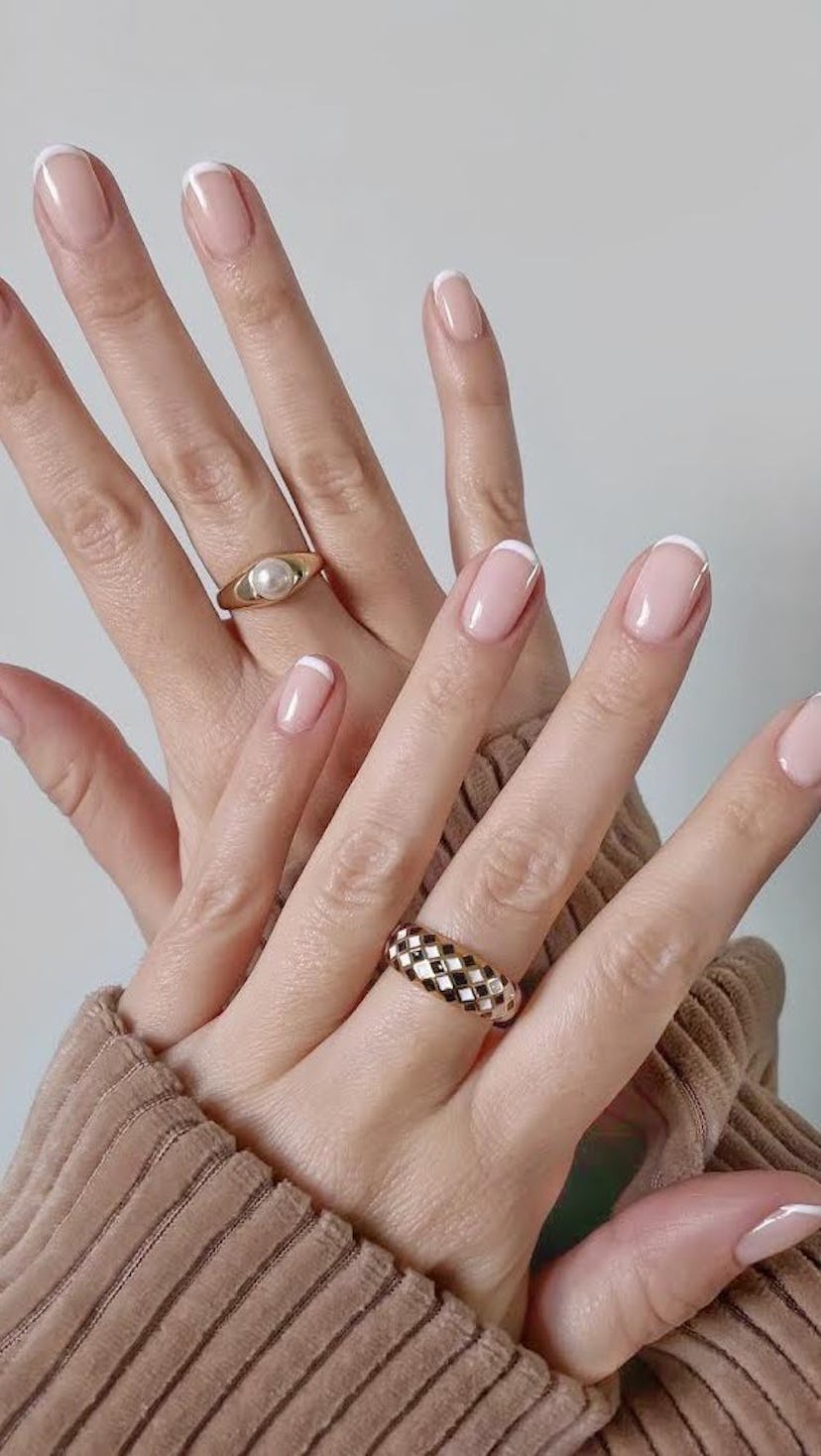 French tip old money nails.