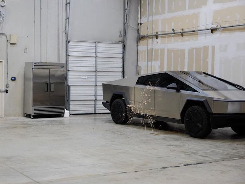 Joe Rogan shooting an arrow at the Cybertruck