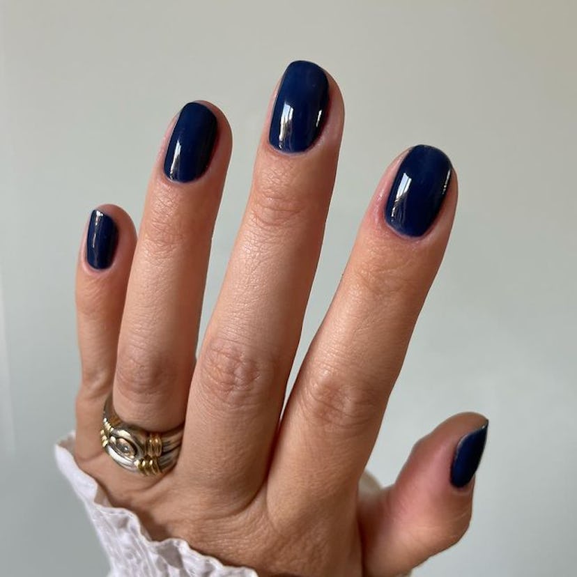 Navy blue nails.