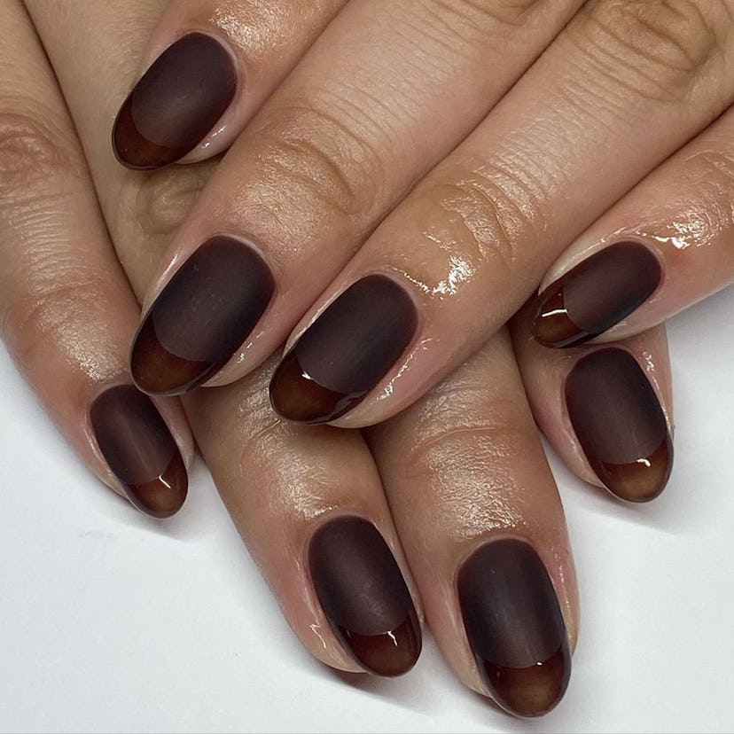 Matte-to-glossy French chocolate brown nails match the dark academia aesthetic.